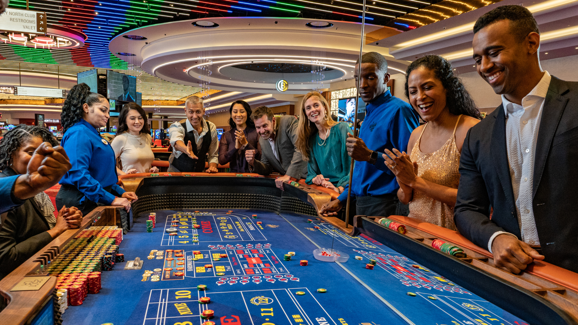 Guests playing at a craps table