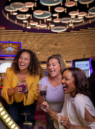 A group of guests enjoying the Casino at Southland Casino and Hotel.