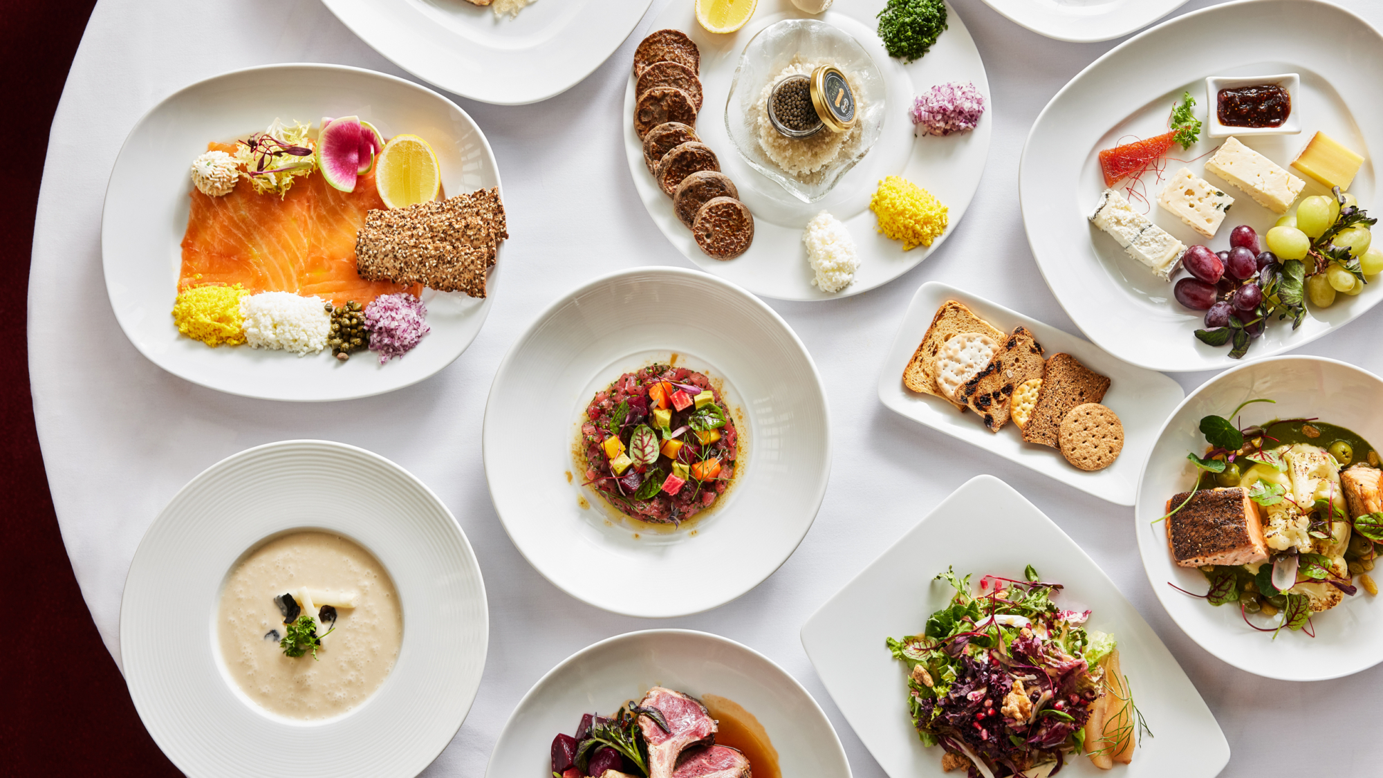 Beautiful table with lots of plated dishes